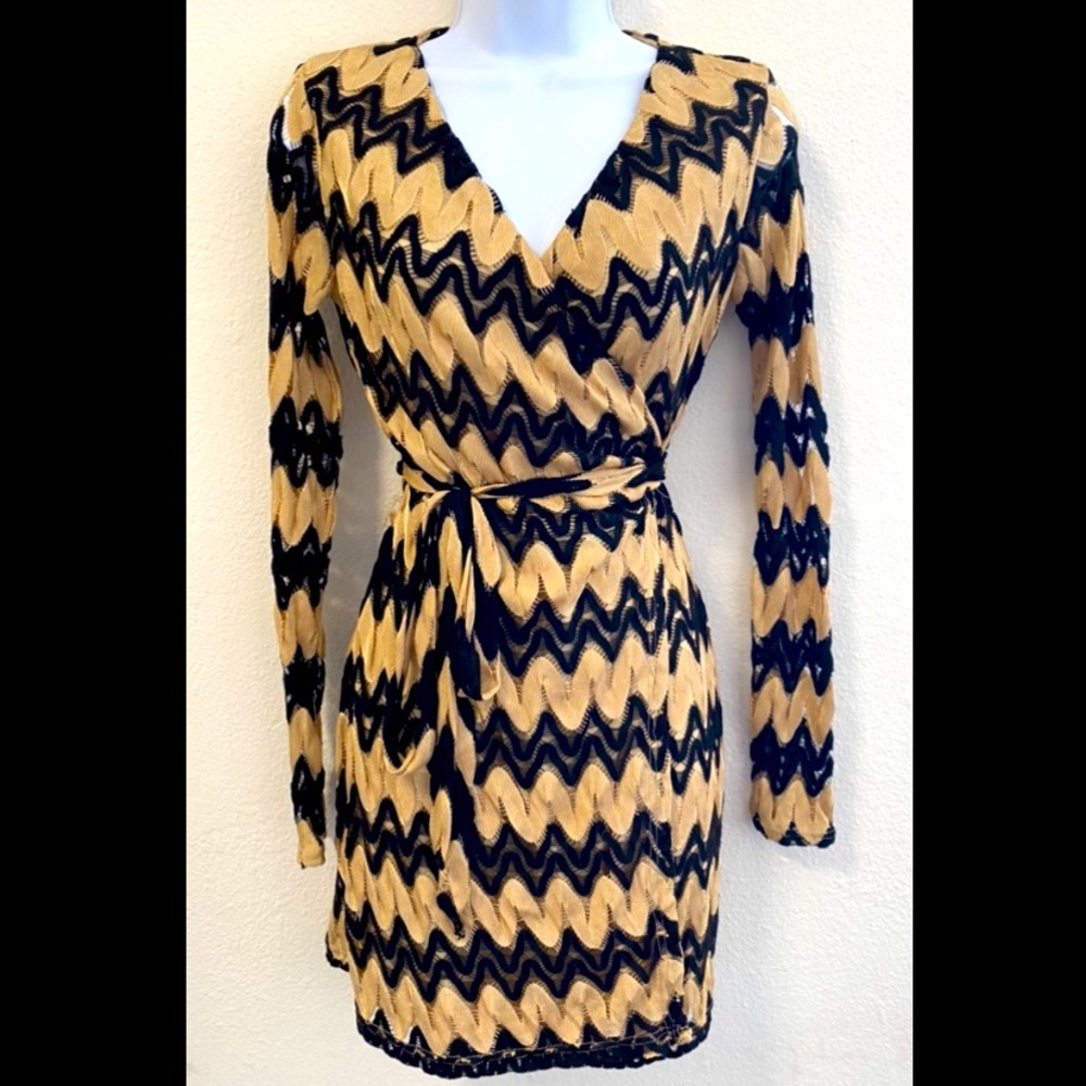Ark & Co. Black and Gold wrap around knee length dress.